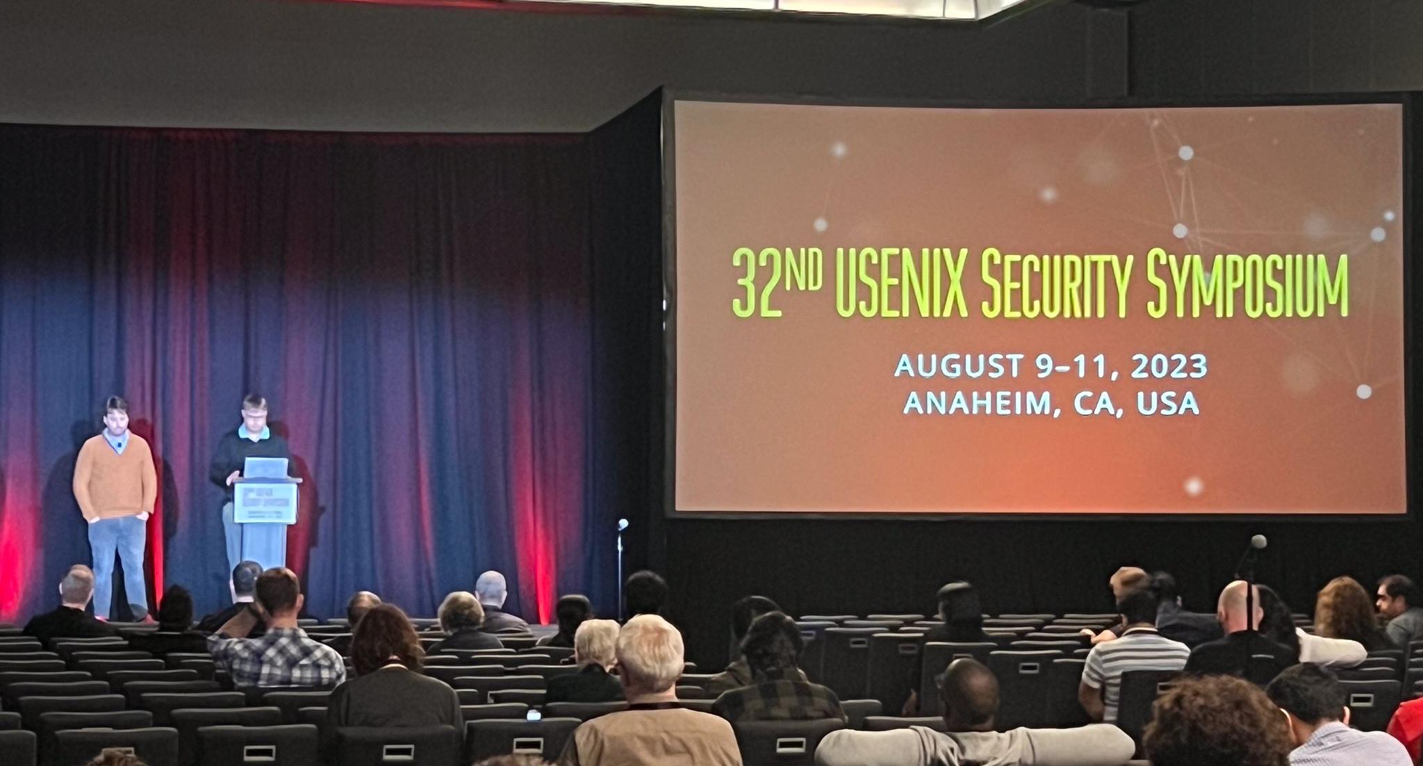 Tristan and Ingolf on stage at USENIX Security 2023